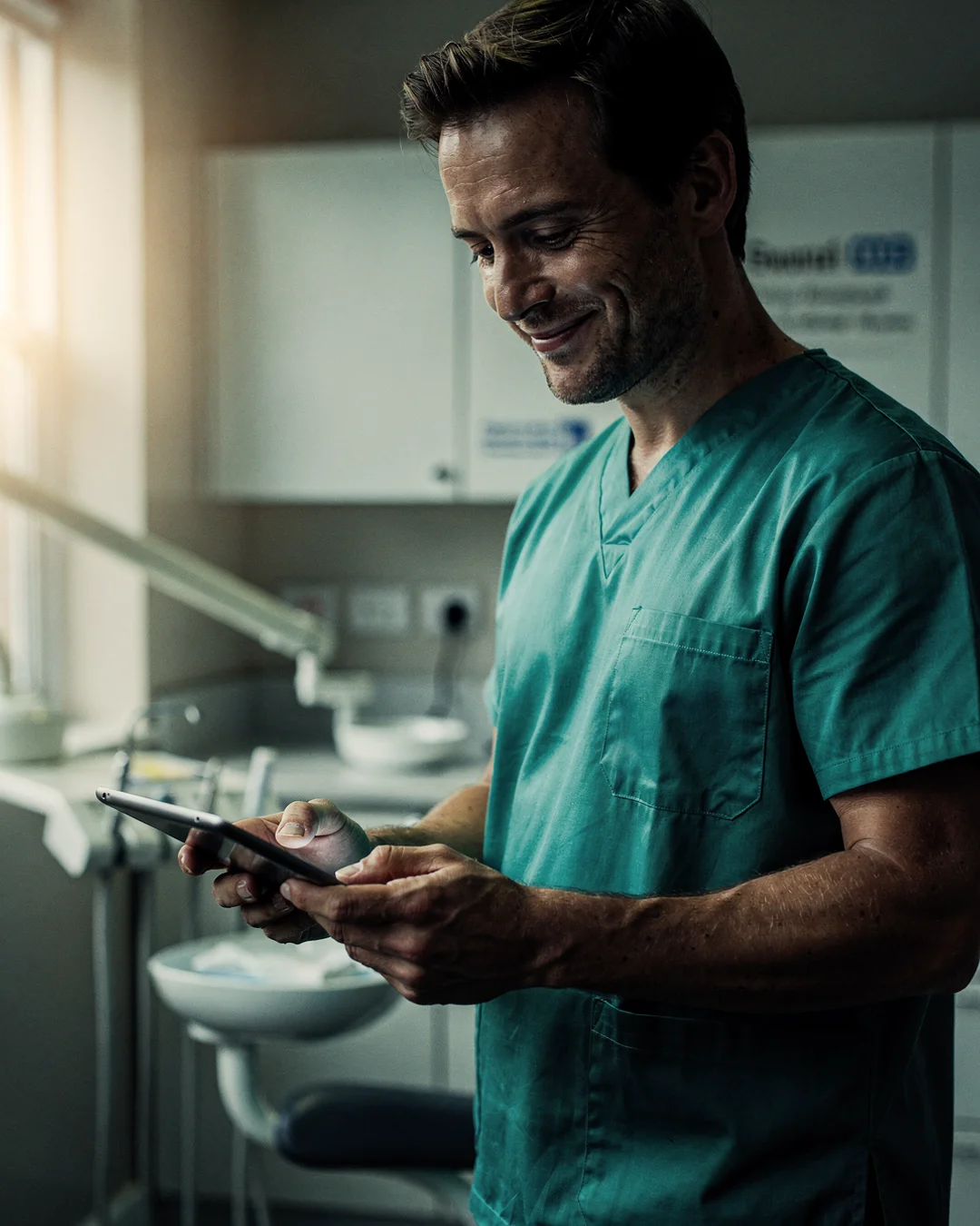 A UK dental clinician at the reception of an independent practice